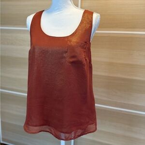 Elegant Rust Sleeveless Top with gold shimmer